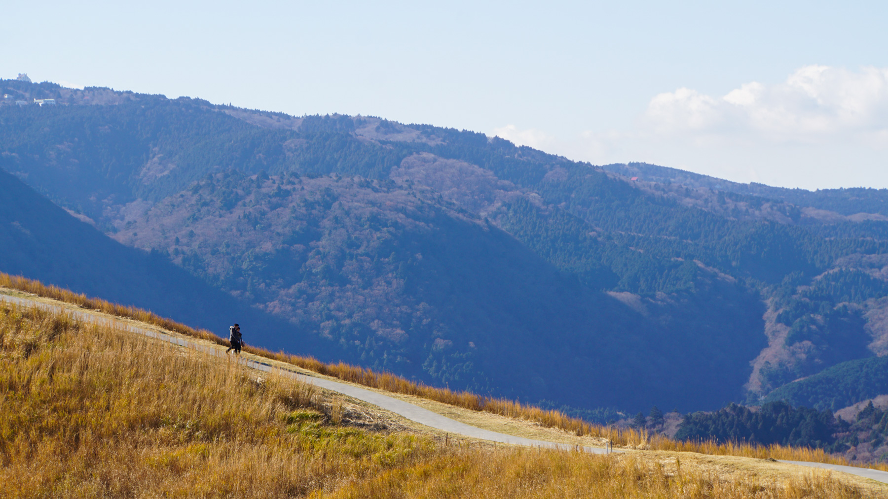 A couple walking down the mountain